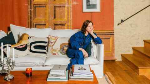 Gabrielle Greiss at home in Origny-le-Butin, Normandy. The theater backdrop is from Maison Close, an antique shop in nearby Bellême