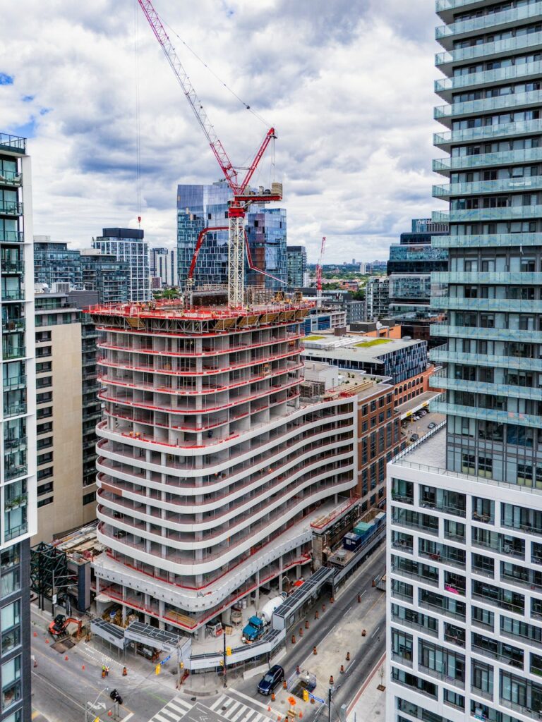 Whitfield Tower is raised with a painted cladding | Urban Toronto